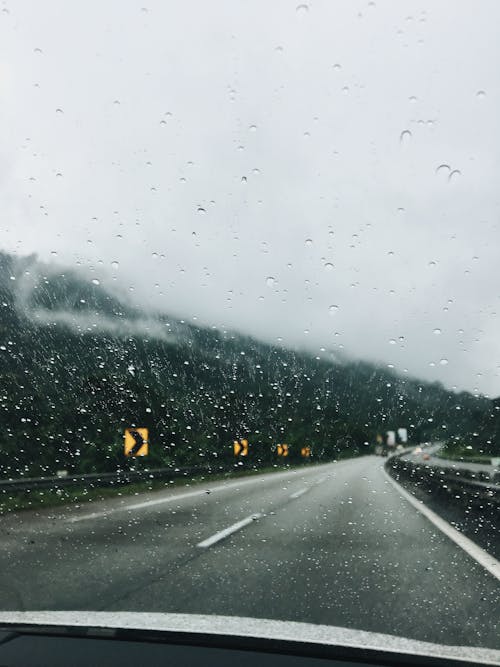 Gratis stockfoto met regenachtig, regenen, reizen