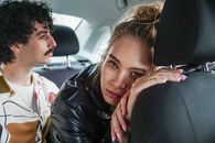 Woman in Black Leather Jacket Sitting on Car Seat