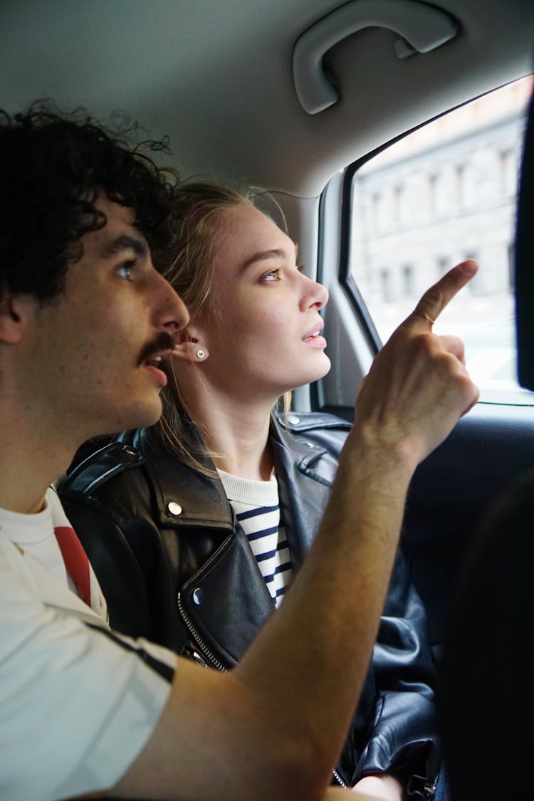 A Romantic Couple Inside The Car