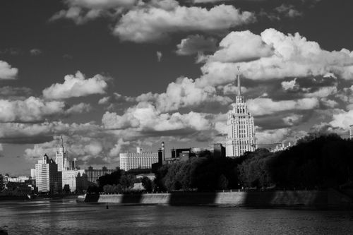 Free Dramatic black and white photo of the Moscow skyline with water and clouds. Stock Photo