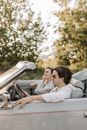 Man and Woman Sitting in the Car