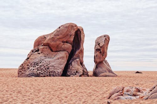 Brown Rock Formation on Brown Sand