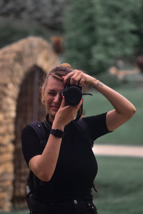 A Woman Holding a Camera