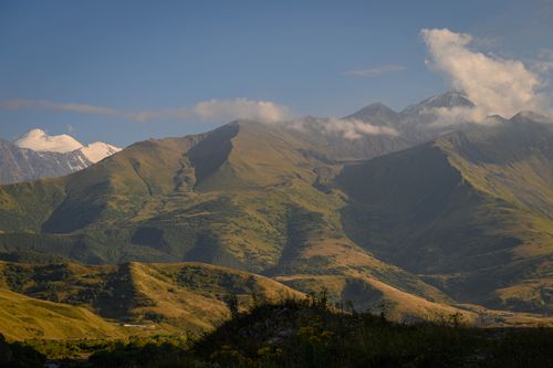 Free Stunning view of a lush mountain landscape in North Ossetia, Russia, under a clear sky. Stock Photo