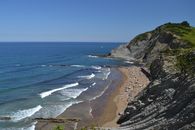 A View of a Beach with People in Vacation
