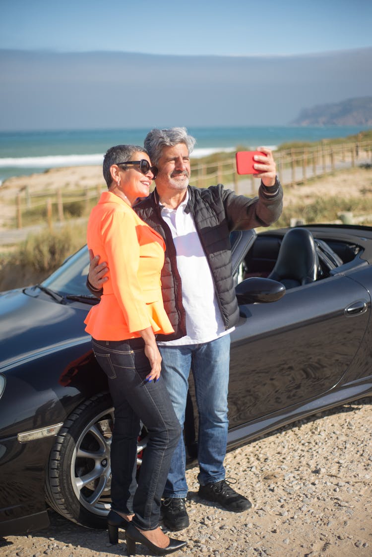 An Elderly Couple Taking Selfie