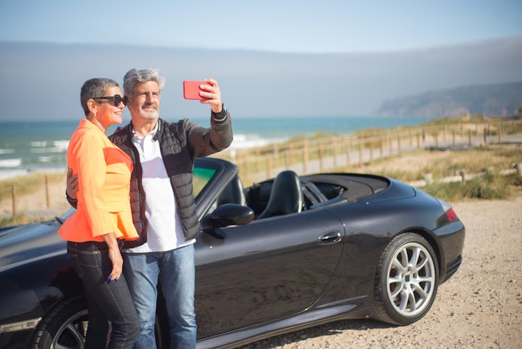 An Elderly Couple Taking Selfie