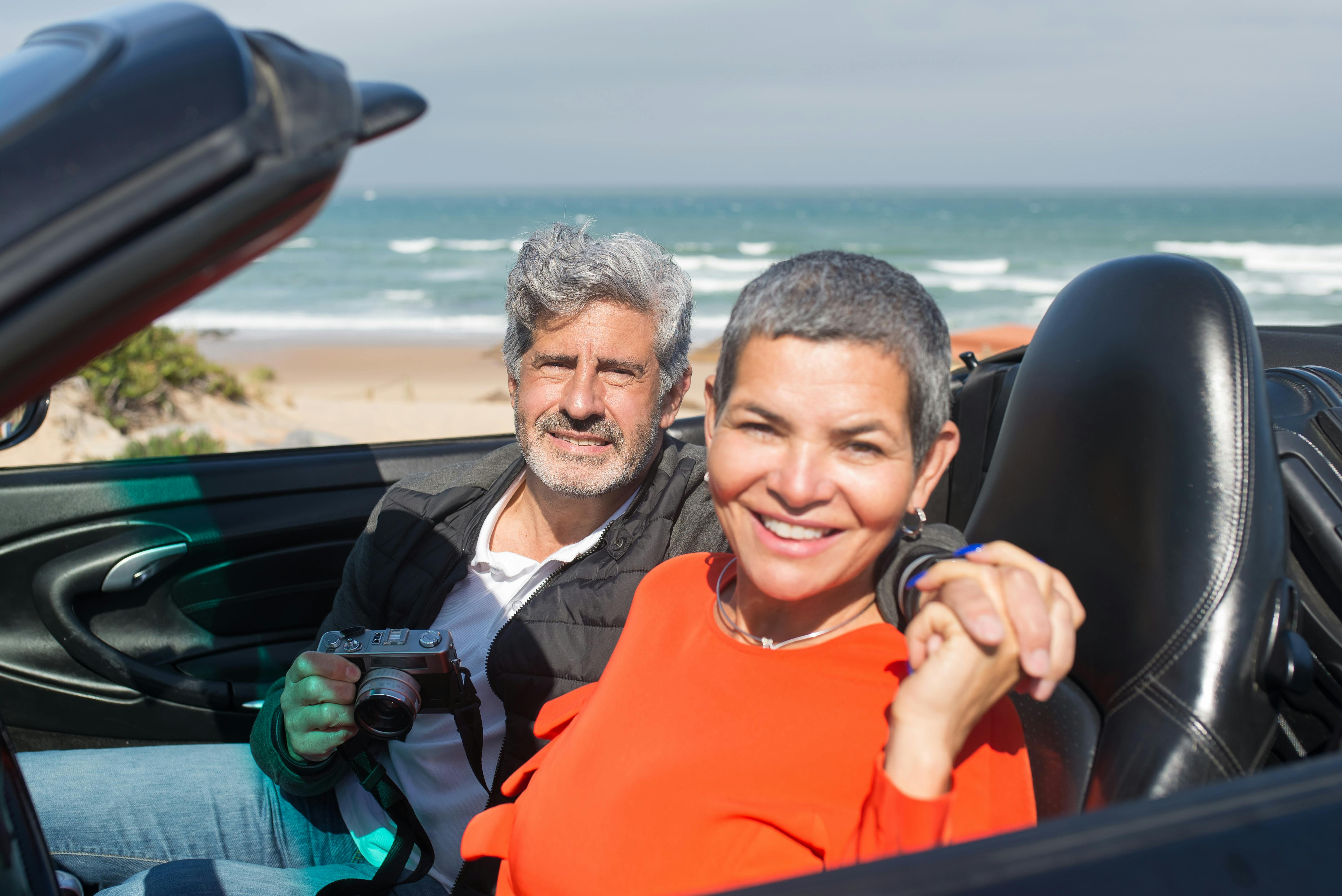 Man and Woman Sitting in the Campervan · Free Stock Photo