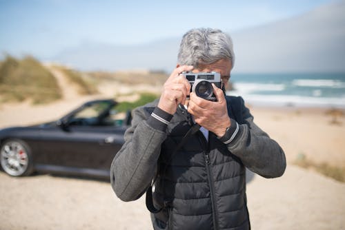 A Man Holding a Camera