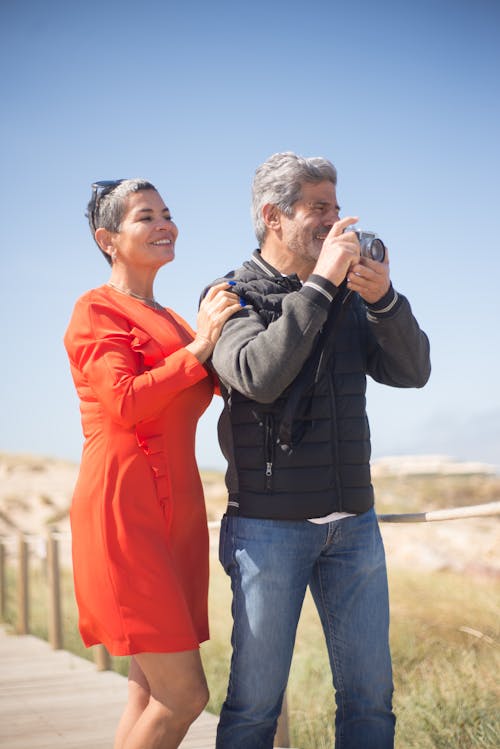 A Couple Standing on the Road