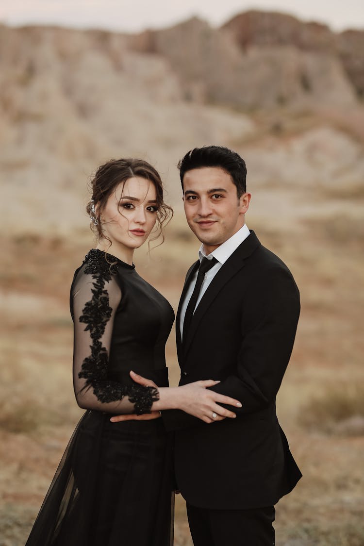 Couple In A Black Elegant Outfits 