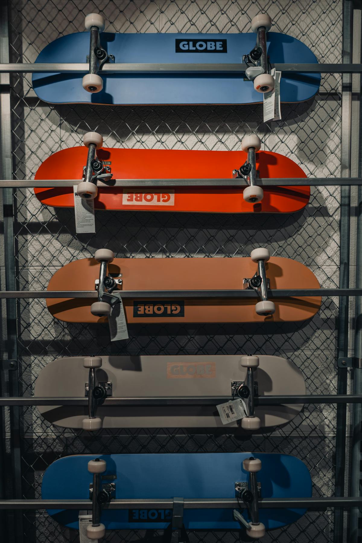 Skateboard deck art collection showcasing controversial political graphics and social commentary designs