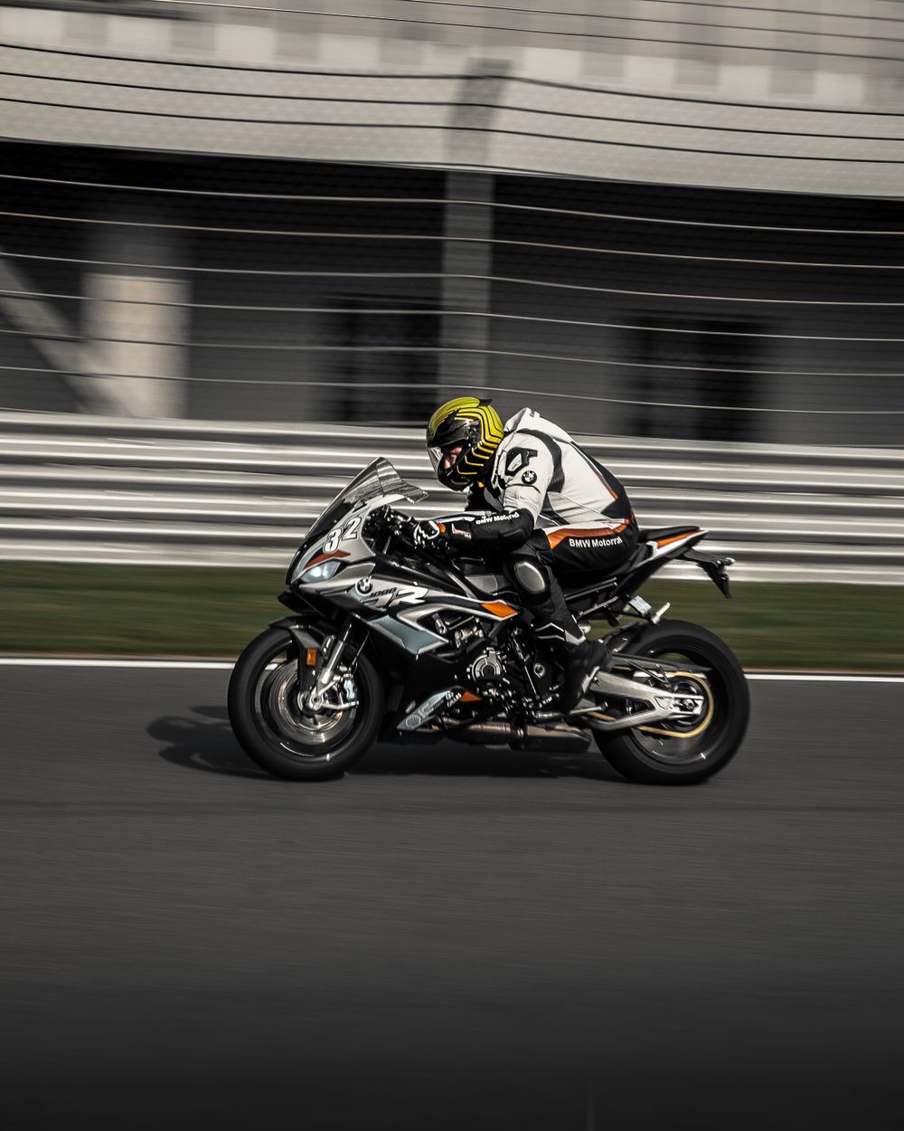 Motorcyclist at high speed on a race track