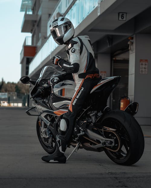 Person Seated on a Motorbike