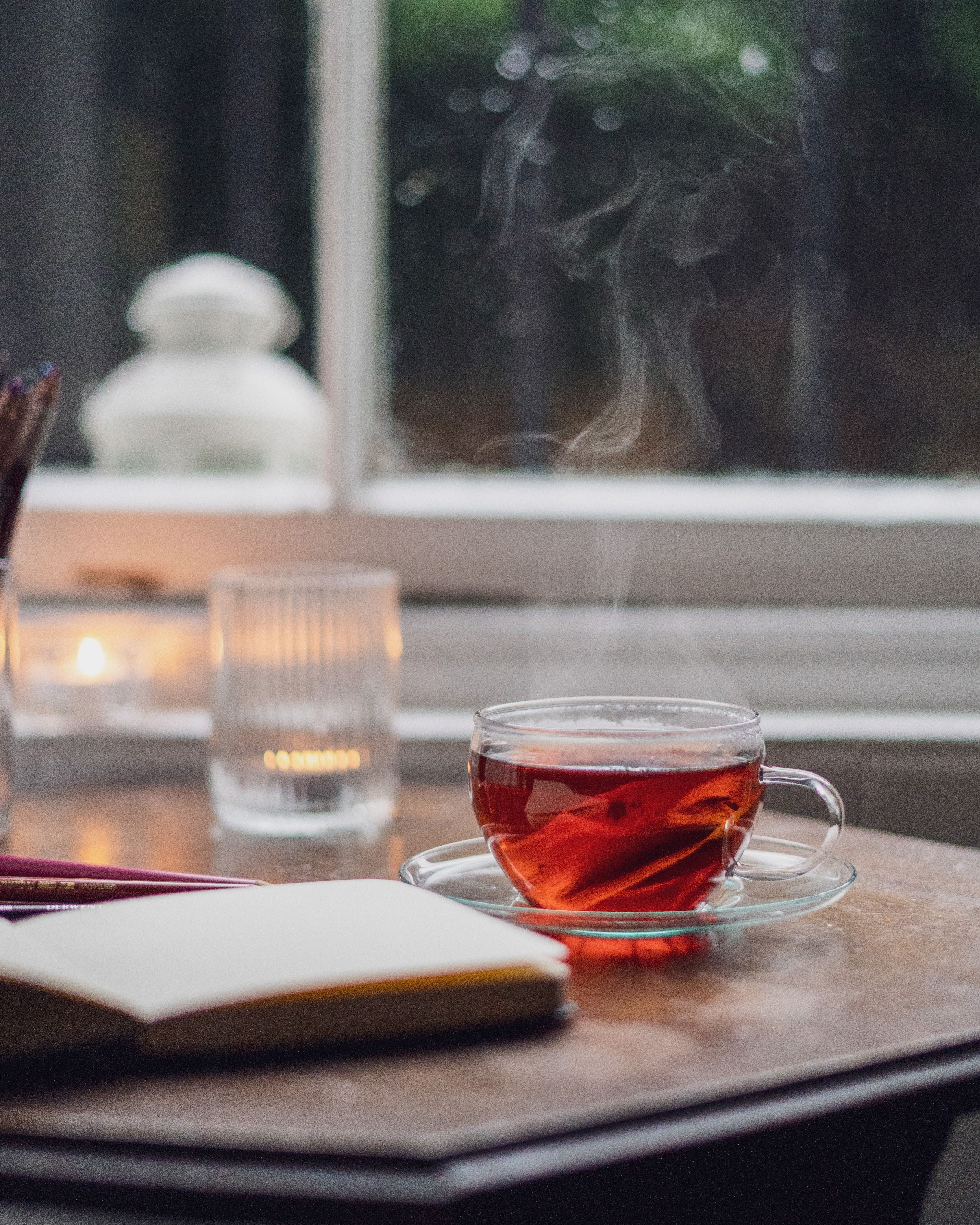 qingcha tea review — Clear Glass Teacup on the Table · Free. Photo: Pexels