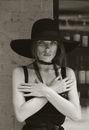Woman in Black Cowboy Hat