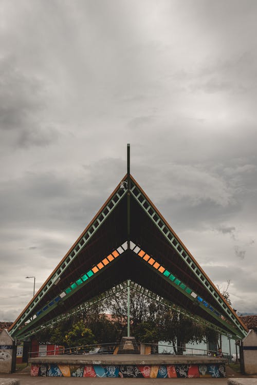 Triangular Roofing Near a Monument