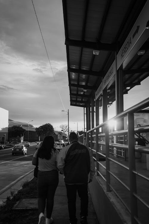 A Couple Walking on the Street