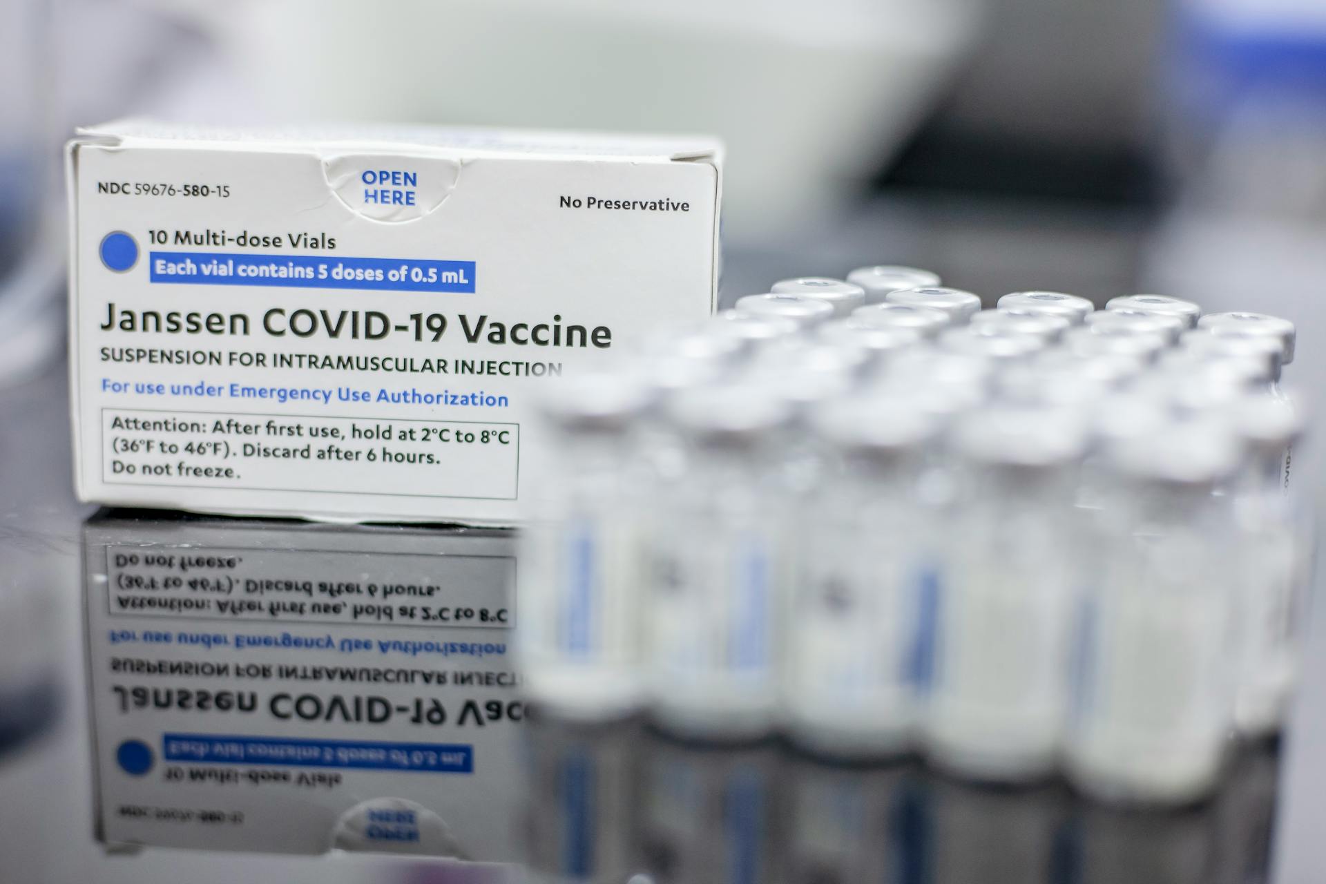 Close-up view of Janssen COVID-19 vaccine box and vials for vaccination use.