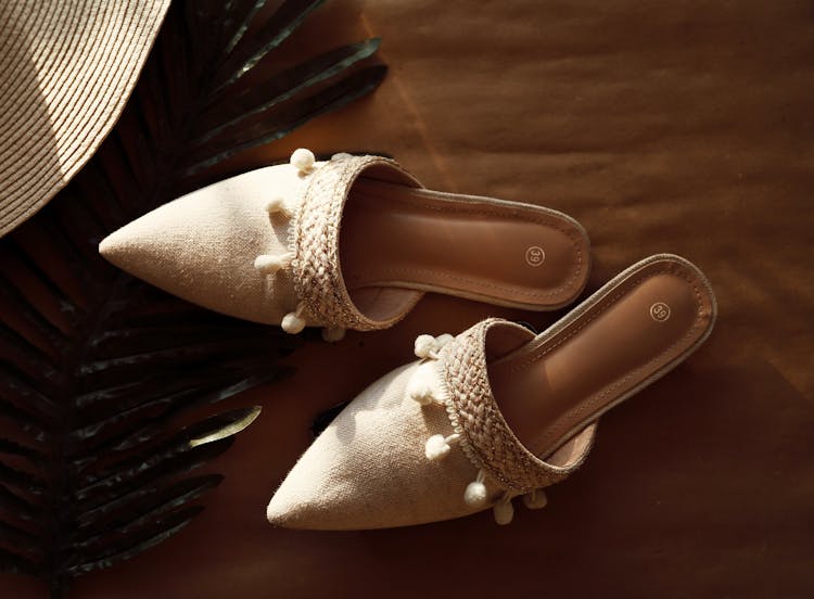 Close-Up Shot Of Beige Flat Sandals