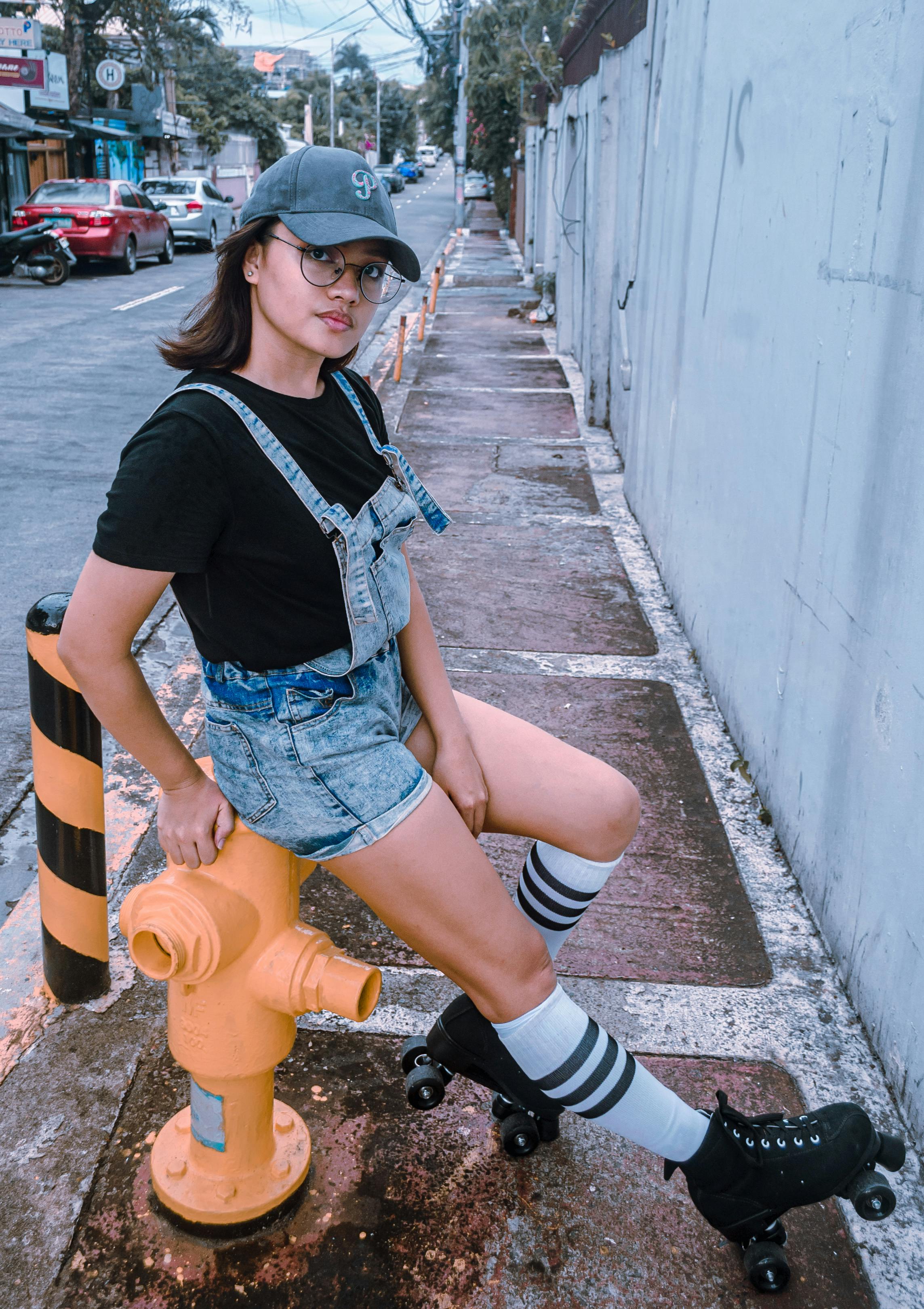 Laughing Woman Sitting on Railing at Skate Park · Free Stock Photo