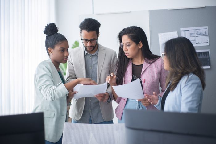 Team reviewing performance charts in a meeting