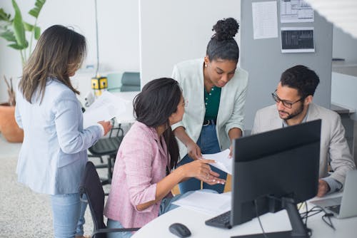 Free People in the Office Having a Discussion Stock Photo