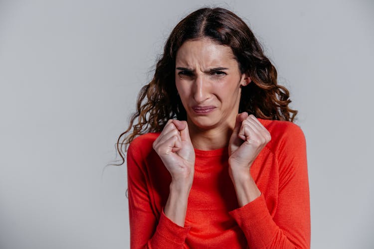 A Woman With A Disgusted Facial Expression