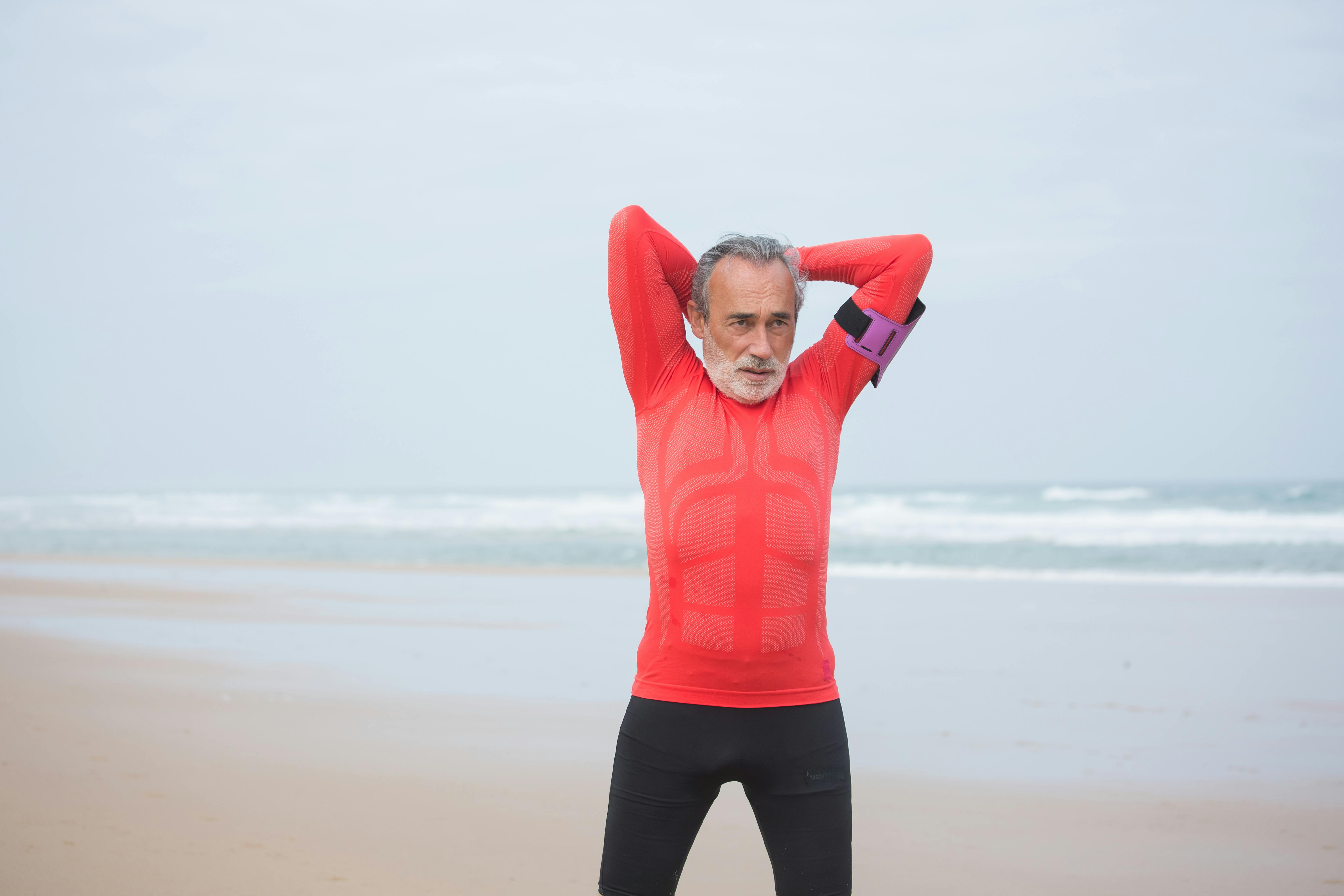 a man in red long sleeve shirt