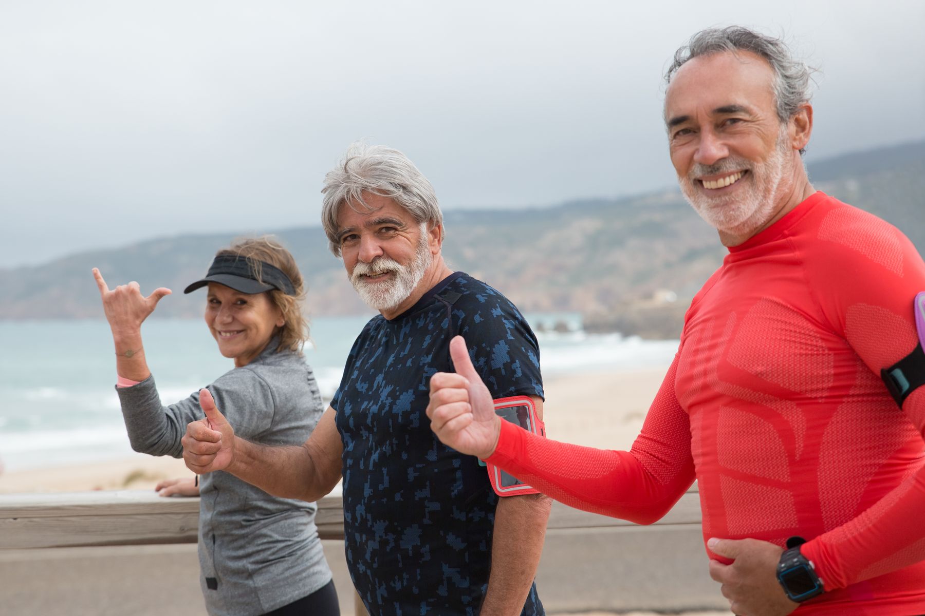 Patients enjoying life after treatment — smiling on a beach