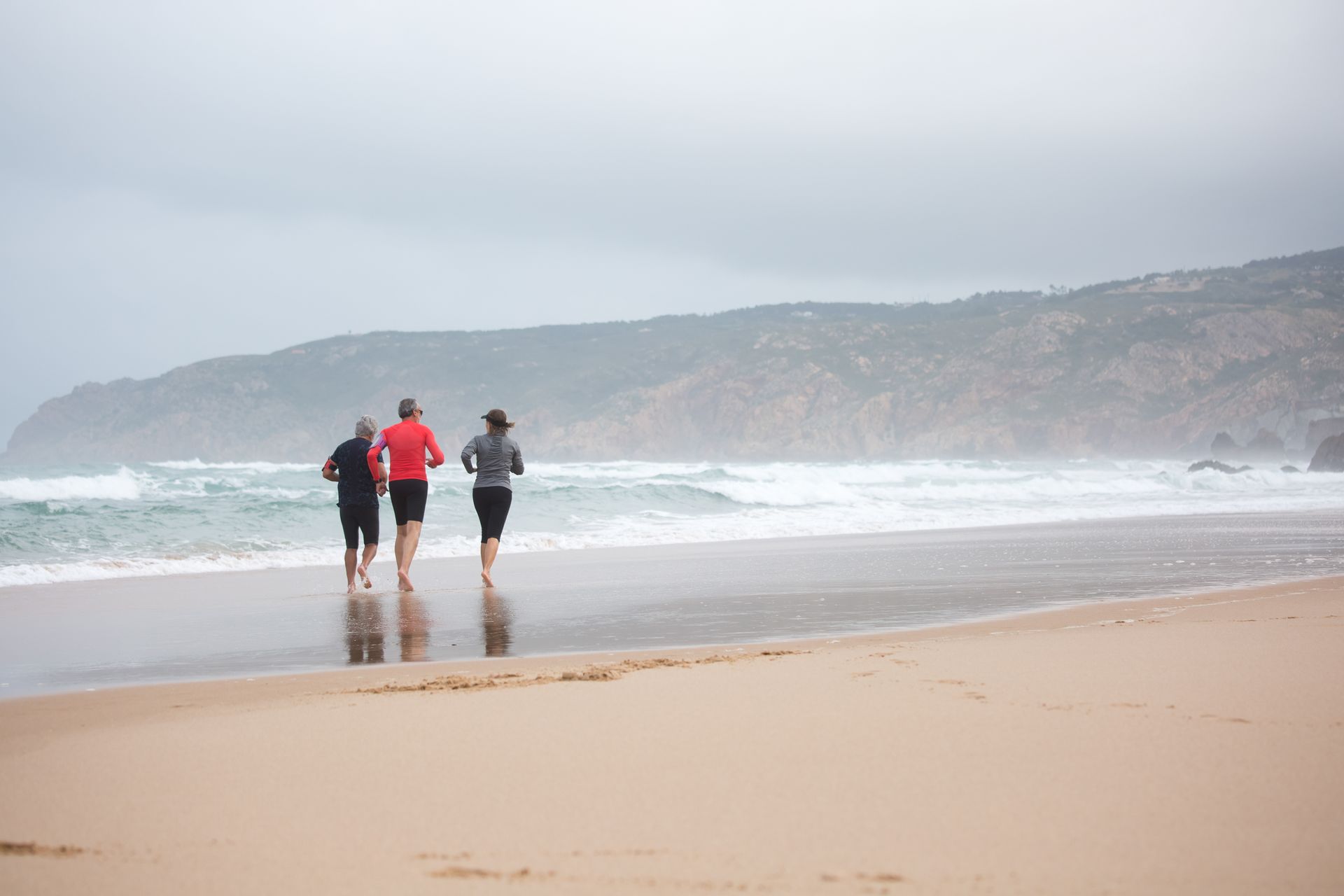 People Running at the Beach
