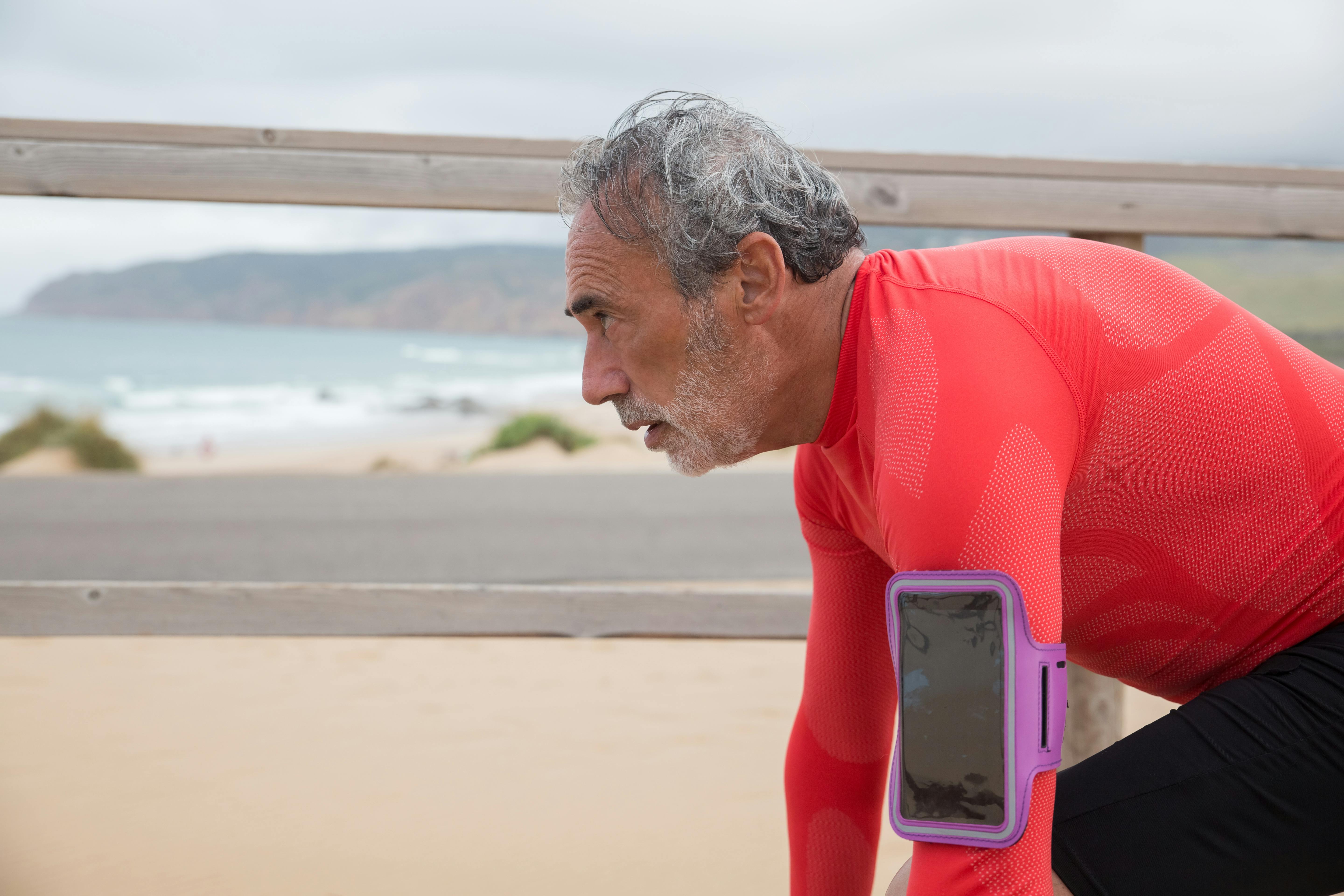 a man in red long sleeve shirt