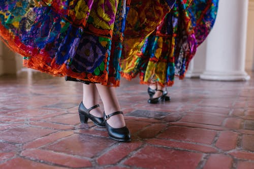 Dancers in Traditional Skirts and Leathers Shoes