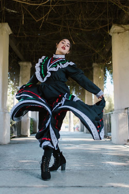 Woman Dancing in a Traditional Costume 