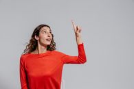 A Woman in Red Long Sleeve Shirt