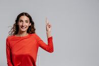 A Woman in Red Long Sleeve Shirt