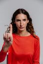 A Woman in Red Long Sleeve Shirt