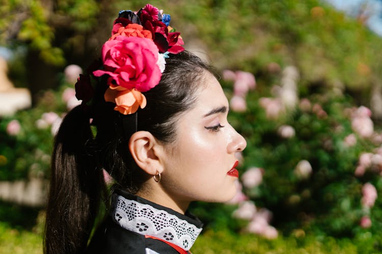 A Woman Wearing Flower Headband