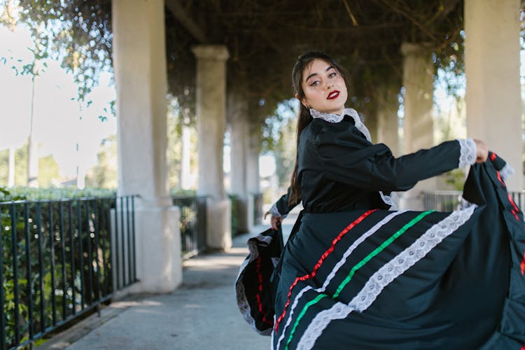 Woman Dancing In Black Flamenco Dress 