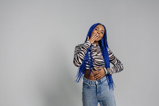 Woman in Blue Hijab and Blue Denim Jeans