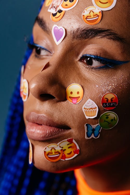 A Woman With Stickers on Her Face