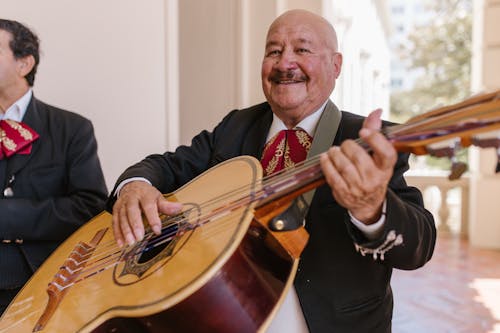 Free Mariachi with a Big Mexican Guitar Stock Photo