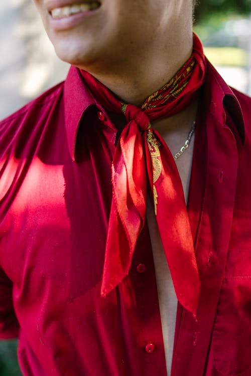 A Man in Red Button Up Shirt