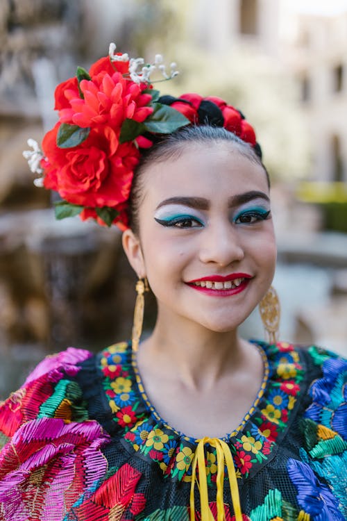 Free Young Woman with a Traditional Floral Headdress Stock Photo