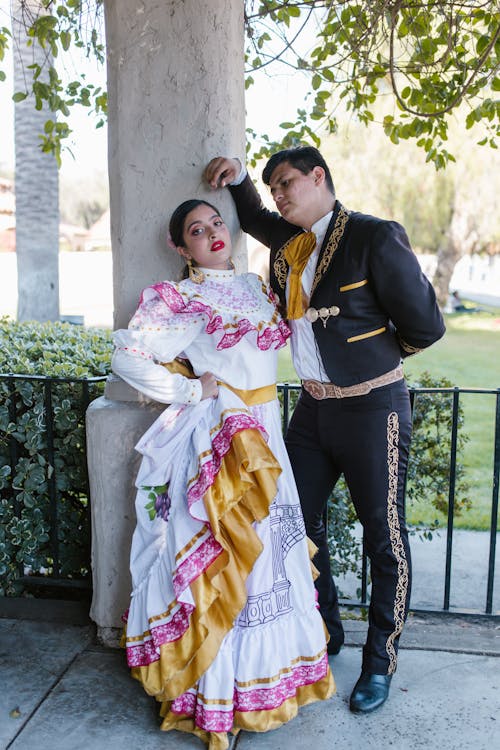 Free Man and Woman Wearing Cinco de Mayo Traditional Clothing Stock Photo