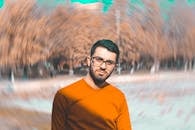 Man in Orange Crew-neck Top