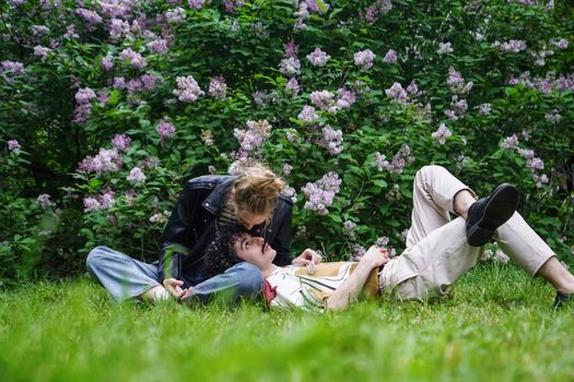 Man Lying on the Lap of a Woman