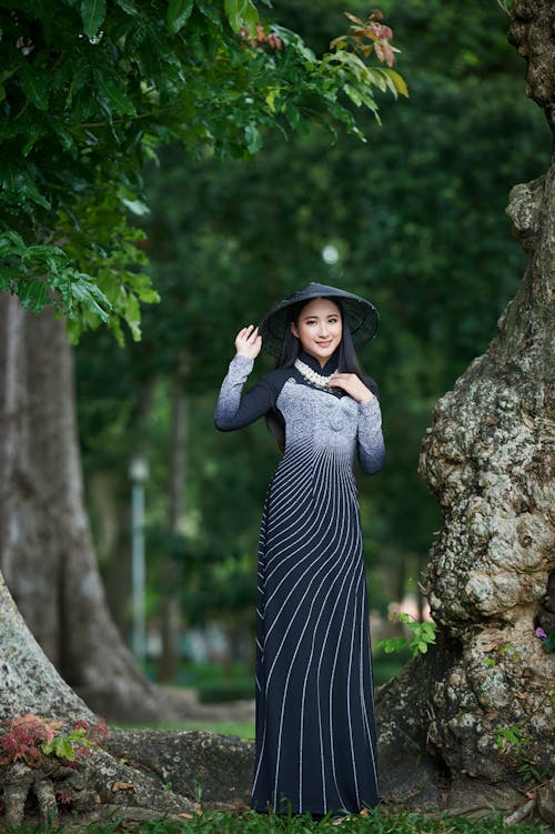 Free Photograph of a Woman Wearing a Black and White Dress Stock Photo