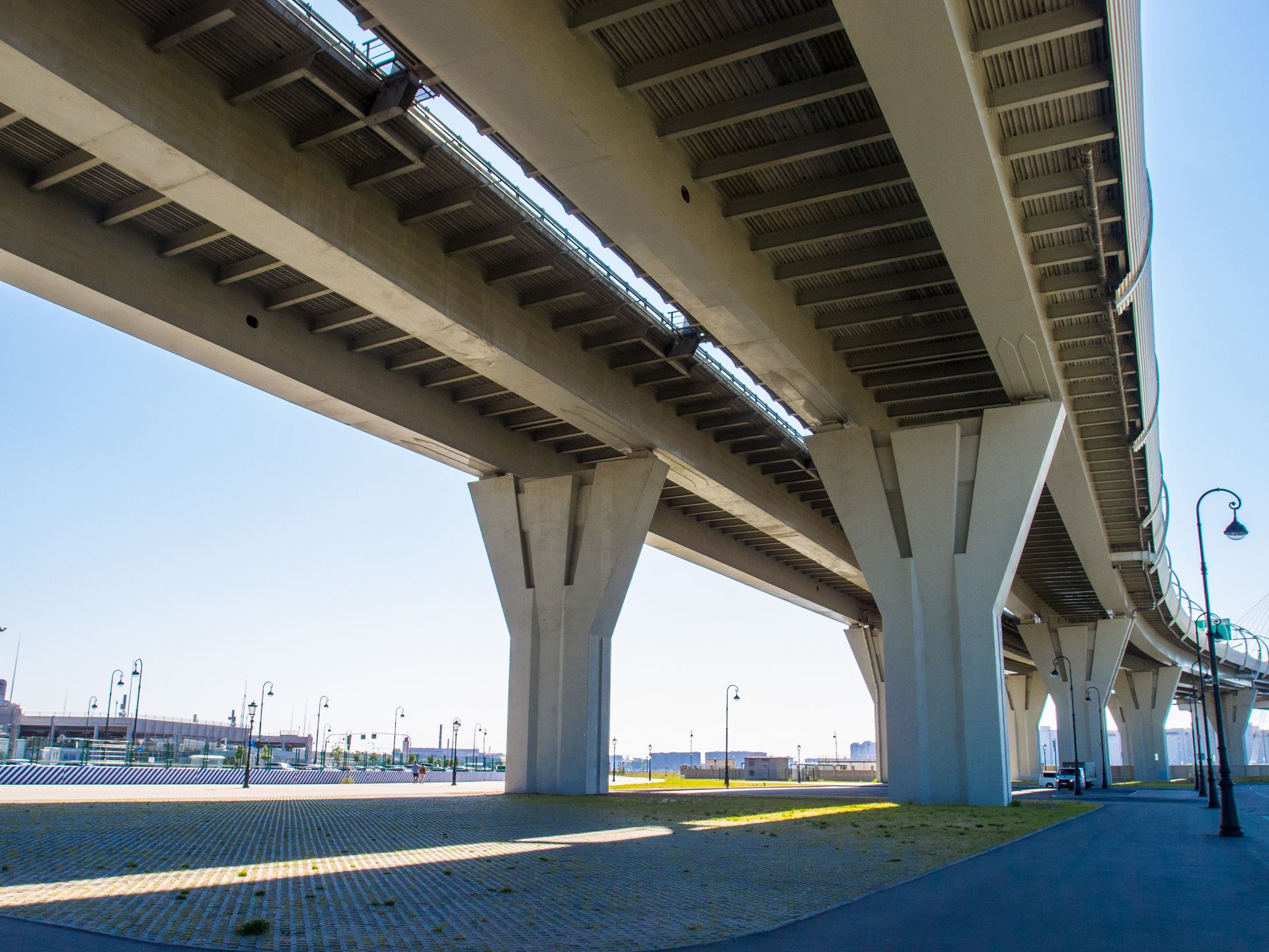A view of a modern elevated highway showcasing urban infrastructure and architecture.