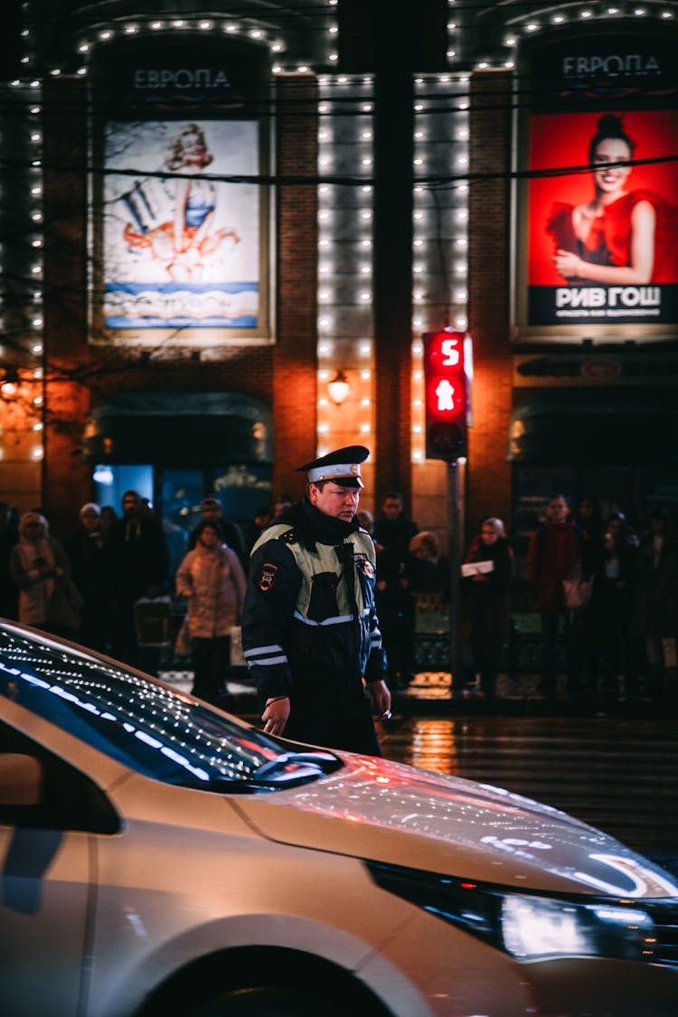 People Standing Before Theatre 